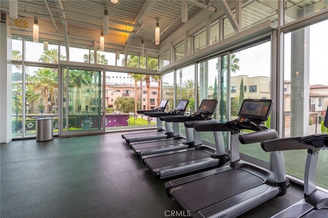 13200 Pacific Promenade Unit 217, Playa Vista, CA 90094 - gym featuring a wall of windows and a high ceiling