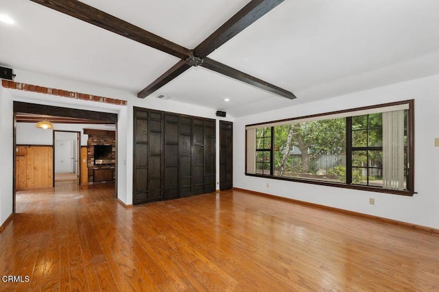 1139 Fairview Dr, La Canada Flintridge, CA 91011 - empty room with beam ceiling, baseboards, wood finished floors, and recessed lighting
