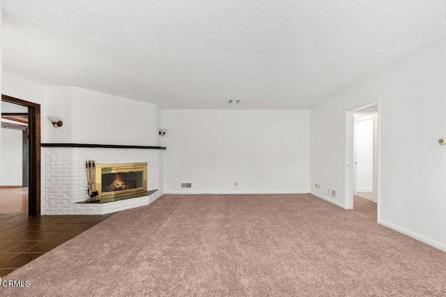 1139 Fairview Dr, La Canada Flintridge, CA 91011 - unfurnished living room with a textured ceiling, a fireplace, carpet floors, and baseboards