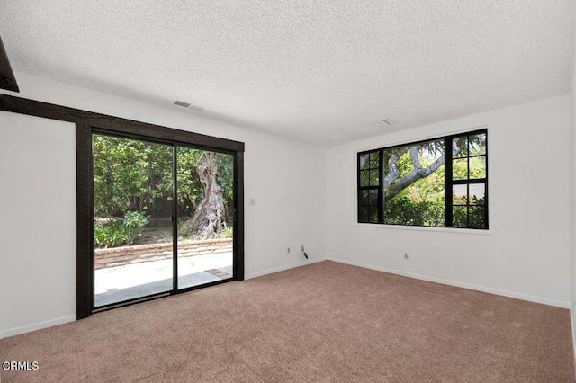1139 Fairview Dr, La Canada Flintridge, CA 91011 - carpeted spare room with a textured ceiling and baseboards
