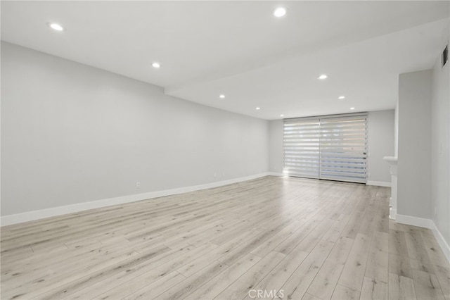 19029 Nordhoff St Unit 103, Northridge, CA 91324 - spare room featuring recessed lighting, light wood finished floors, and baseboards