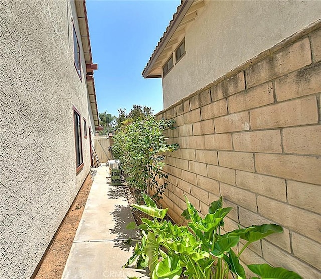 6237 Birdie Dr, La Verne, CA 91750 - view of side of home featuring stucco siding