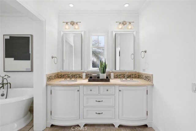 111 Brooks, Laguna Beach, CA 92651 - full bathroom featuring double vanity, a freestanding bath, crown molding, and recessed lighting