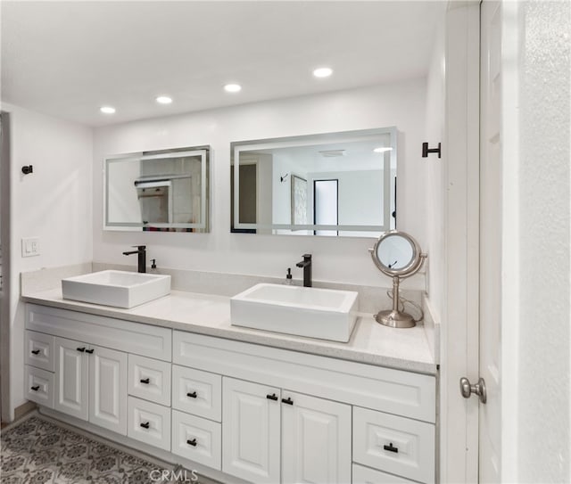 20645 Roscoe Blvd Unit G, Winnetka, CA 91306 - bathroom with double vanity and recessed lighting