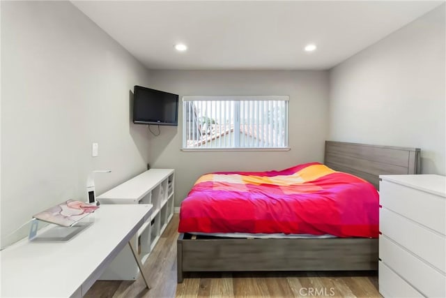 20645 Roscoe Blvd Unit G, Winnetka, CA 91306 - bedroom with wood finished floors and recessed lighting
