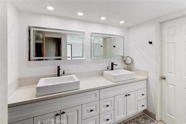 20645 Roscoe Blvd Unit G, Winnetka, CA 91306 - bathroom featuring double vanity and recessed lighting