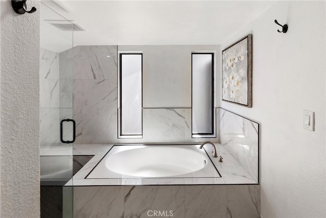 20645 Roscoe Blvd Unit G, Winnetka, CA 91306 - bathroom featuring a bath and a marble finish shower