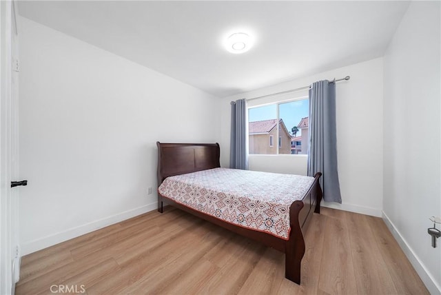 7358 Freedom Pl, Rancho Cucamonga, CA 91730 - bedroom with light wood-style flooring and baseboards