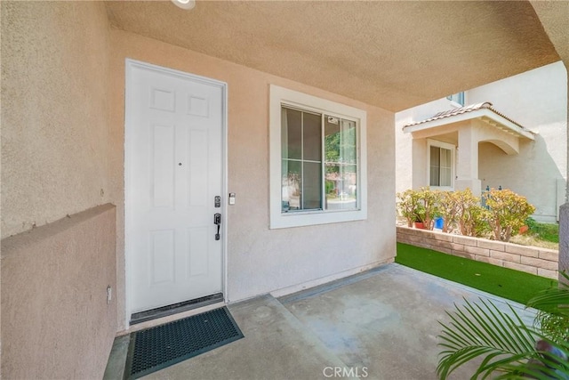 7358 Freedom Pl, Rancho Cucamonga, CA 91730 - doorway to property featuring stucco siding and a patio