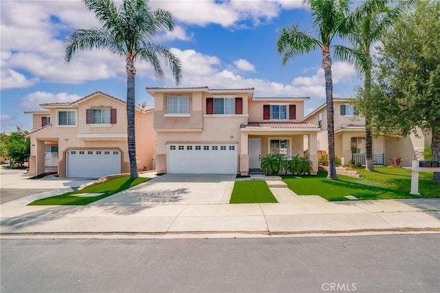 7358 Freedom Pl, Rancho Cucamonga, CA 91730 - mediterranean / spanish-style house with stucco siding, a garage, a tiled roof, and driveway