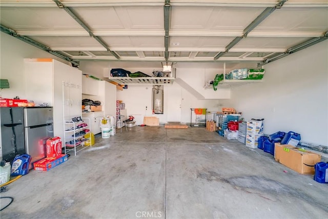 7358 Freedom Pl, Rancho Cucamonga, CA 91730 - garage featuring water heater and freestanding refrigerator