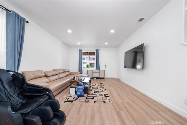 7358 Freedom Pl, Rancho Cucamonga, CA 91730 - living room featuring light wood-style floors, recessed lighting, and baseboards