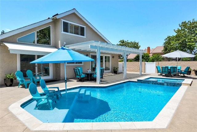 14652 Danborough Rd, Tustin, CA 92780 - back of property with stucco siding, a pergola, a patio, and a pool with connected hot tub