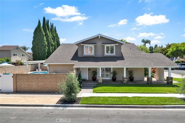 14652 Danborough Rd, Tustin, CA 92780 - view of front of house with a porch, roof with shingles, and stucco siding