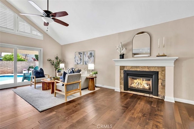 14652 Danborough Rd, Tustin, CA 92780 - living room featuring high vaulted ceiling, hardwood / wood-style flooring, a ceiling fan, and a tile fireplace