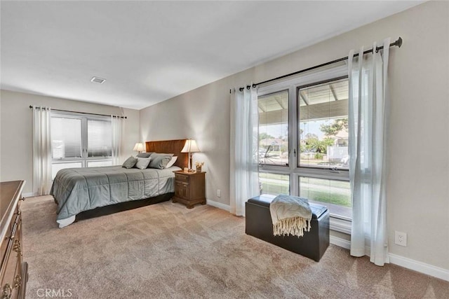 14652 Danborough Rd, Tustin, CA 92780 - bedroom with multiple windows and light carpet