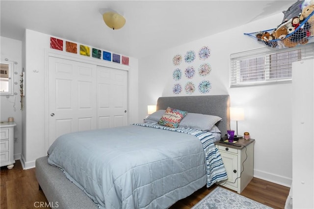 448 Radcliff St, Morro Bay, CA 93442 - bedroom featuring dark wood-type flooring, baseboards, and a closet