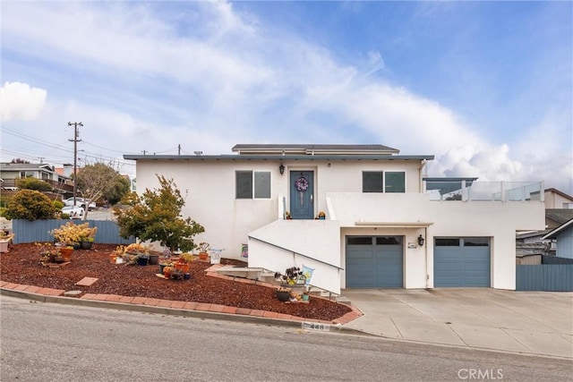 448 Radcliff St, Morro Bay, CA 93442 - view of front of property featuring stucco siding, an attached garage, and concrete driveway