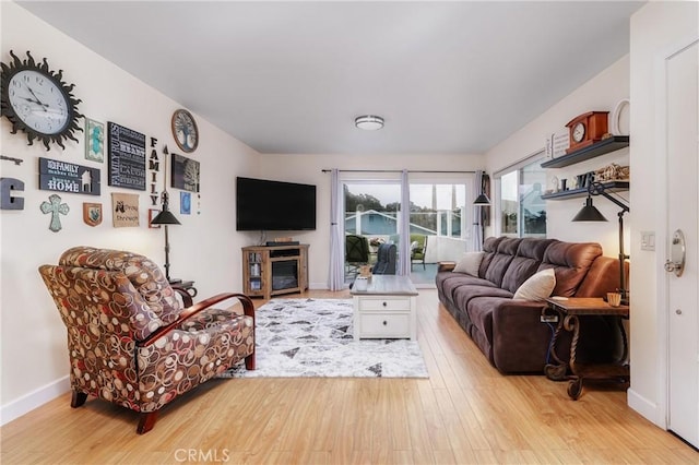 448 Radcliff St, Morro Bay, CA 93442 - living room featuring light wood finished floors and baseboards
