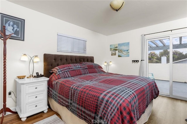 448 Radcliff St, Morro Bay, CA 93442 - bedroom featuring access to outside and light wood-type flooring