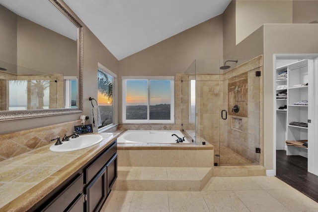 9552 Babauta Rd, San Diego, CA 92129 - bathroom with a garden tub, a shower stall, high vaulted ceiling, vanity, and a spacious closet