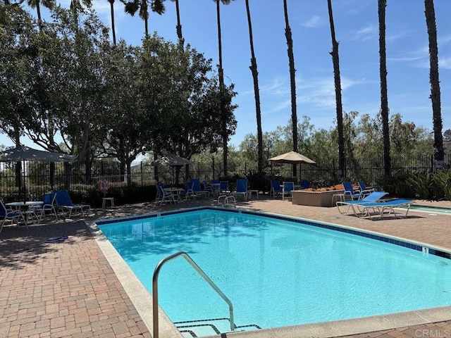 9552 Babauta Rd, San Diego, CA 92129 - community pool with a patio