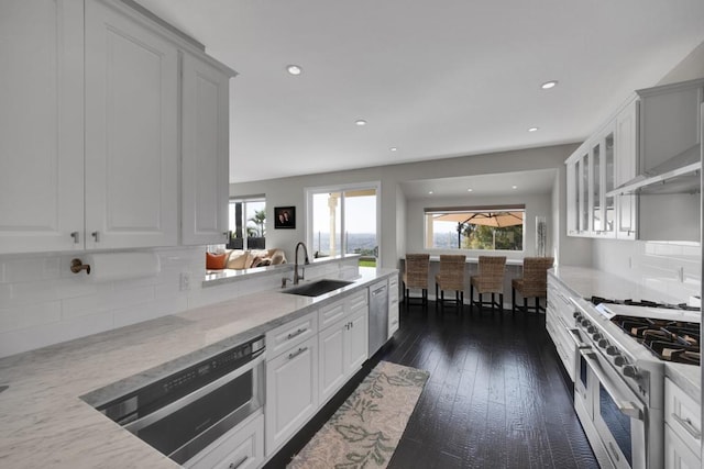 9552 Babauta Rd, San Diego, CA 92129 - kitchen featuring stainless steel appliances, light stone countertops, white cabinets, and recessed lighting