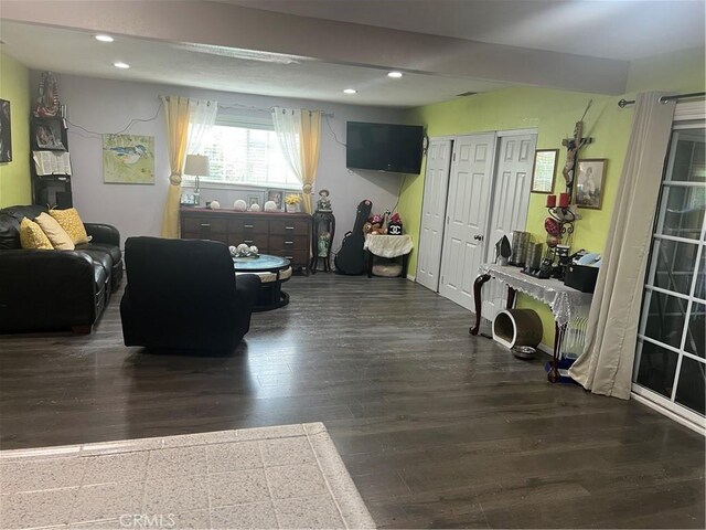 8943 Delano Dr, Riverside, CA 92503 - living room with wood finished floors and recessed lighting