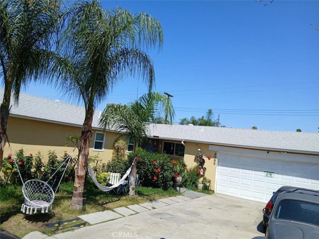 8943 Delano Dr, Riverside, CA 92503 - single story home featuring stucco siding, a garage, and driveway