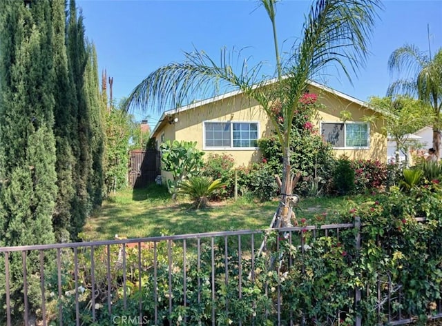 8943 Delano Dr, Riverside, CA 92503 - view of front of home with stucco siding