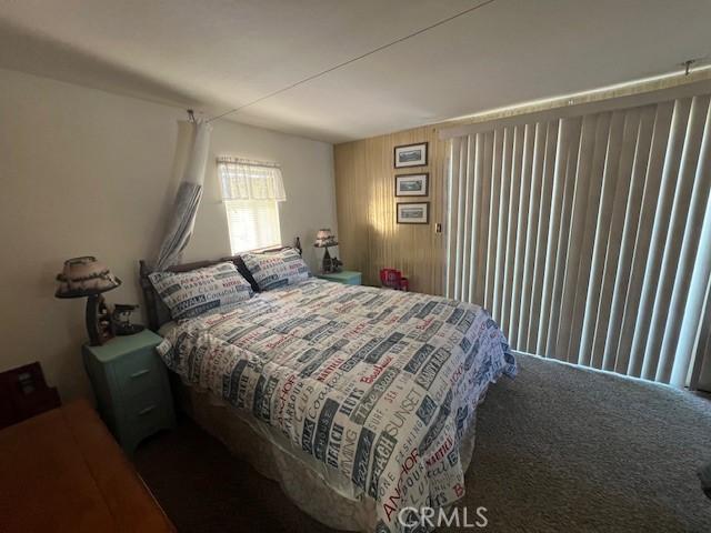 13238 Ebbtide, Clearlake Oaks, CA 95423 - carpeted bedroom featuring wood walls
