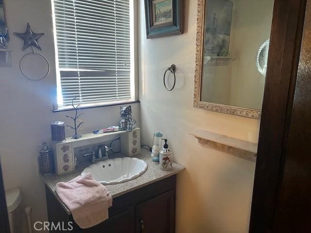13238 Ebbtide, Clearlake Oaks, CA 95423 - bathroom featuring vanity and toilet