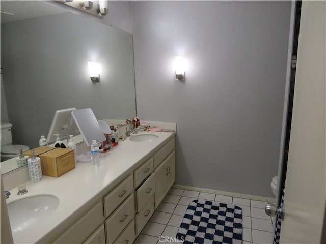 5744 E Creekside Ave Unit 10, Orange, CA 92869 - full bath featuring toilet, double vanity, and tile patterned flooring