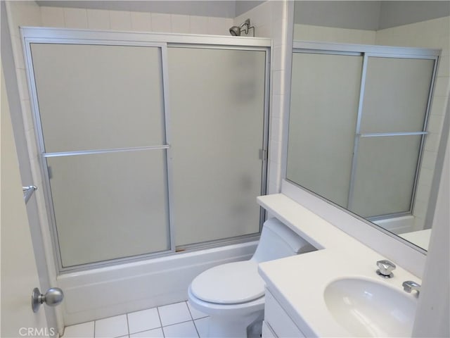 5744 E Creekside Ave Unit 10, Orange, CA 92869 - full bath with toilet, vanity, tile patterned flooring, and combined bath / shower with glass door