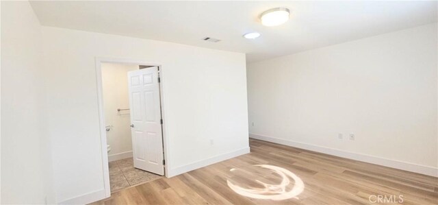 25687 Sandy Lodge Rd, Menifee, CA 92586 - unfurnished room featuring wood finished floors and baseboards