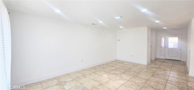 25687 Sandy Lodge Rd, Menifee, CA 92586 - spare room featuring recessed lighting and baseboards