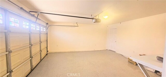 25687 Sandy Lodge Rd, Menifee, CA 92586 - garage featuring a garage door opener