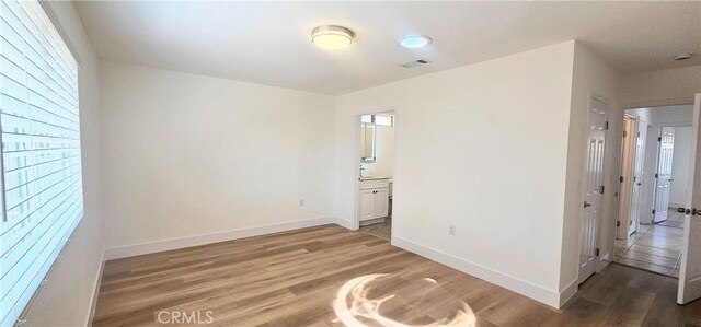 25687 Sandy Lodge Rd, Menifee, CA 92586 - unfurnished room featuring light wood finished floors and baseboards