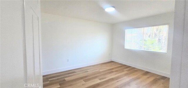 25687 Sandy Lodge Rd, Menifee, CA 92586 - unfurnished room featuring light wood-style flooring and baseboards