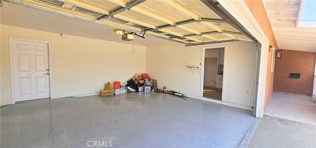 25687 Sandy Lodge Rd, Menifee, CA 92586 - garage featuring a garage door opener