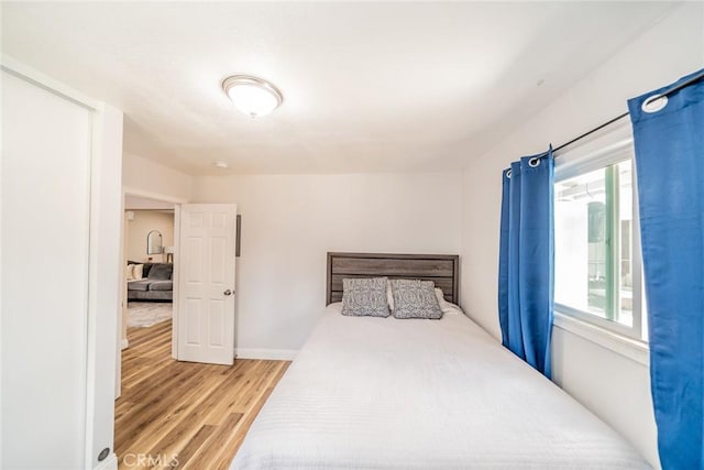 414 Iowa Ave, Riverside, CA 92507 - bedroom with light wood-style flooring
