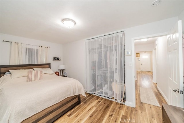 414 Iowa Ave, Riverside, CA 92507 - bedroom featuring light wood-style floors and baseboards