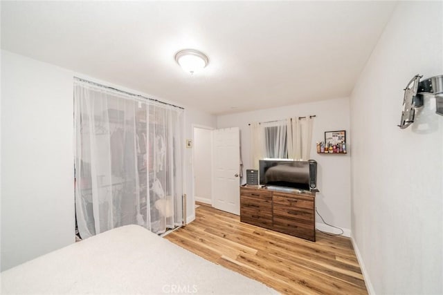 414 Iowa Ave, Riverside, CA 92507 - bedroom featuring light wood-style floors and baseboards