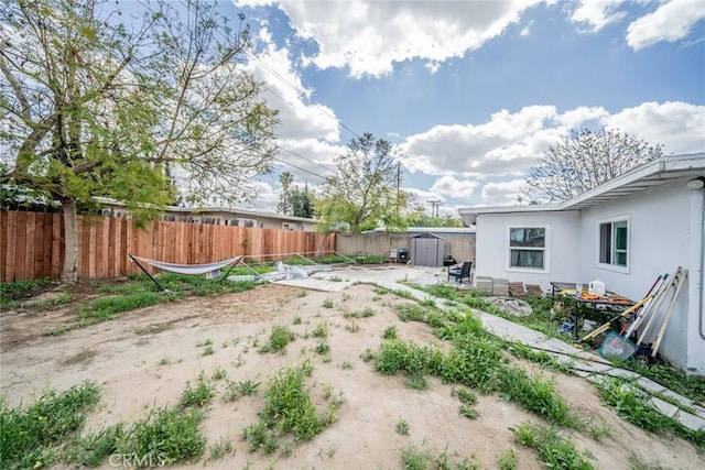 414 Iowa Ave, Riverside, CA 92507 - fenced backyard with a shed
