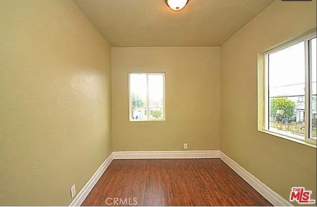 5102 Woodlawn Ave, Los Angeles, CA 90011 - unfurnished room featuring plenty of natural light and wood finished floors