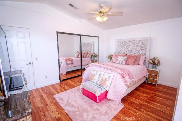 27126 Majello Ct, Temecula, CA 92591 - bedroom with vaulted ceiling, a closet, wood finished floors, and ceiling fan