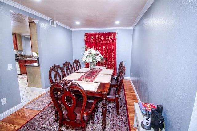 27126 Majello Ct, Temecula, CA 92591 - dining room with light wood-type flooring, recessed lighting, and crown molding