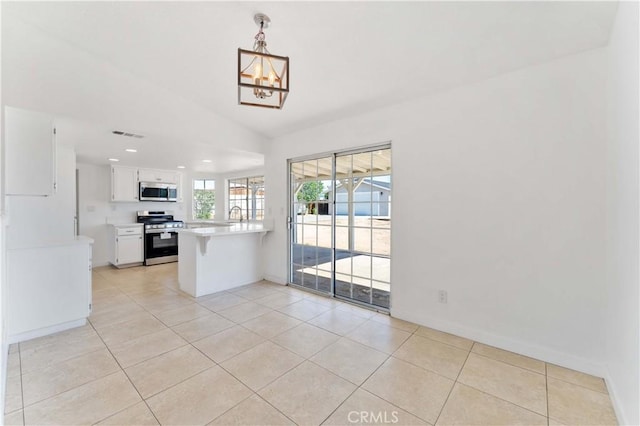 18346 Hackberry St, Hesperia, CA 92345 - unfurnished dining area with light tile patterned floors, a chandelier, baseboards, recessed lighting, and vaulted ceiling