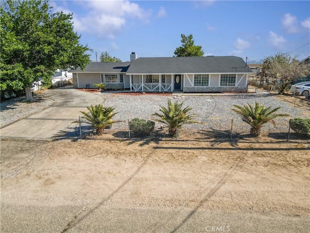 18346 Hackberry St, Hesperia, CA 92345 - ranch-style home with a porch, driveway, and a chimney