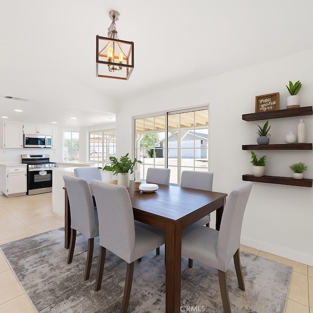 18346 Hackberry St, Hesperia, CA 92345 - dining room with light tile patterned flooring, a chandelier, recessed lighting, and baseboards